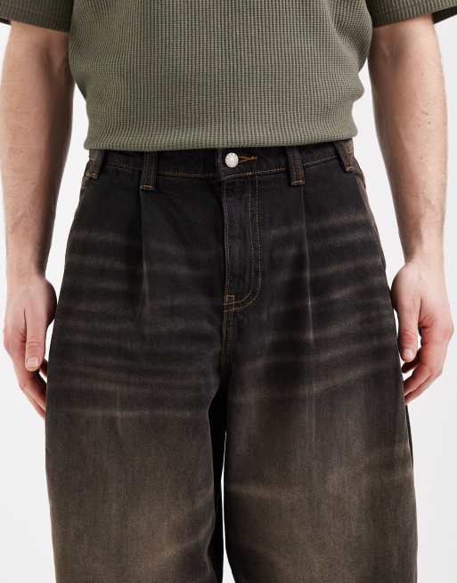 ASOS DESIGN – Bleksvarta och gultonade jeans i oversize med avsmalnande passform, 5 av 5