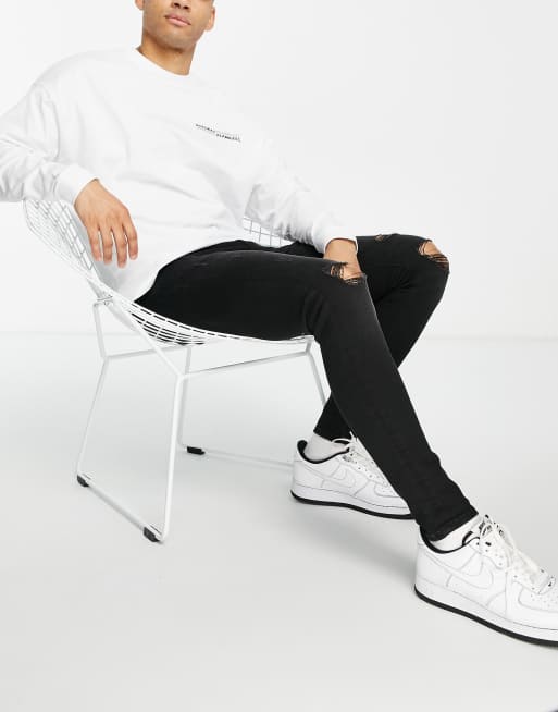 ASOS DESIGN – Bleksvarta spray on-jeans med powerstretch, knärevor och slitna detaljer, 4 av 4