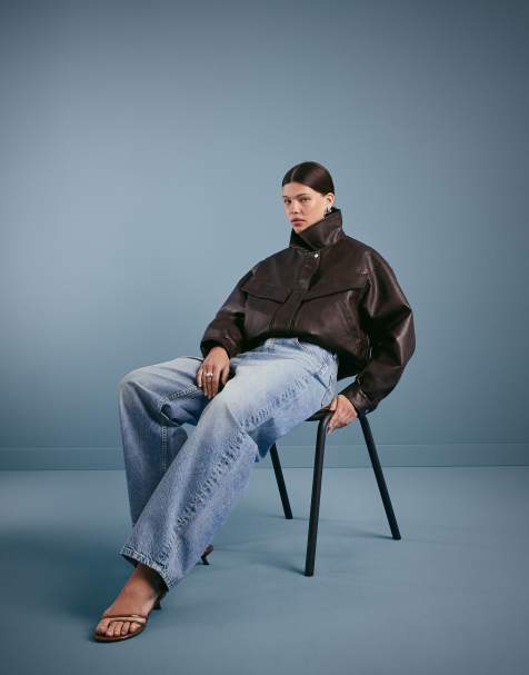 ASOS DESIGN – Blekt vintageblå jeans med barrelben och hög midja - view 1