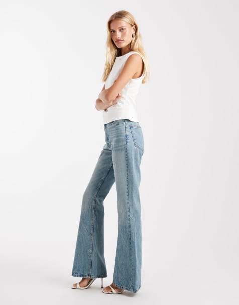 ASOS DESIGN – Blekta, vintagetvättade, utsvängda jeans i 90-talsstil - view 1