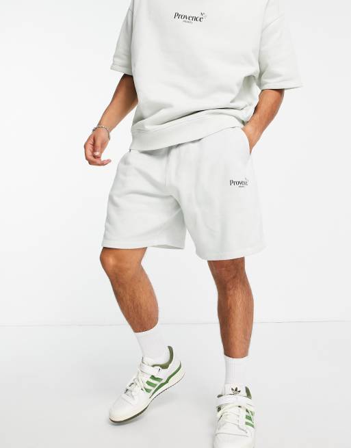 ASOS DESIGN – Blekvita shorts i oversize modell med stadstryck i ekologisk bomull - VIT