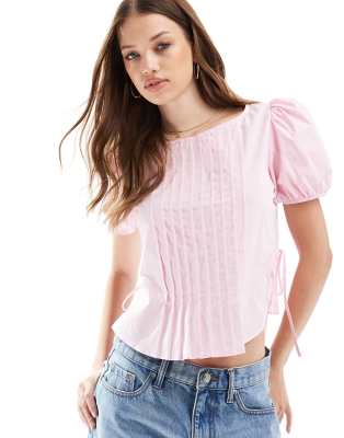 ASOS DESIGN - Blouse à nervures et manches bouffantes - Rose