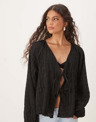ASOS DESIGN - Blouse texturée à décolleté plongeant et lien-Noir