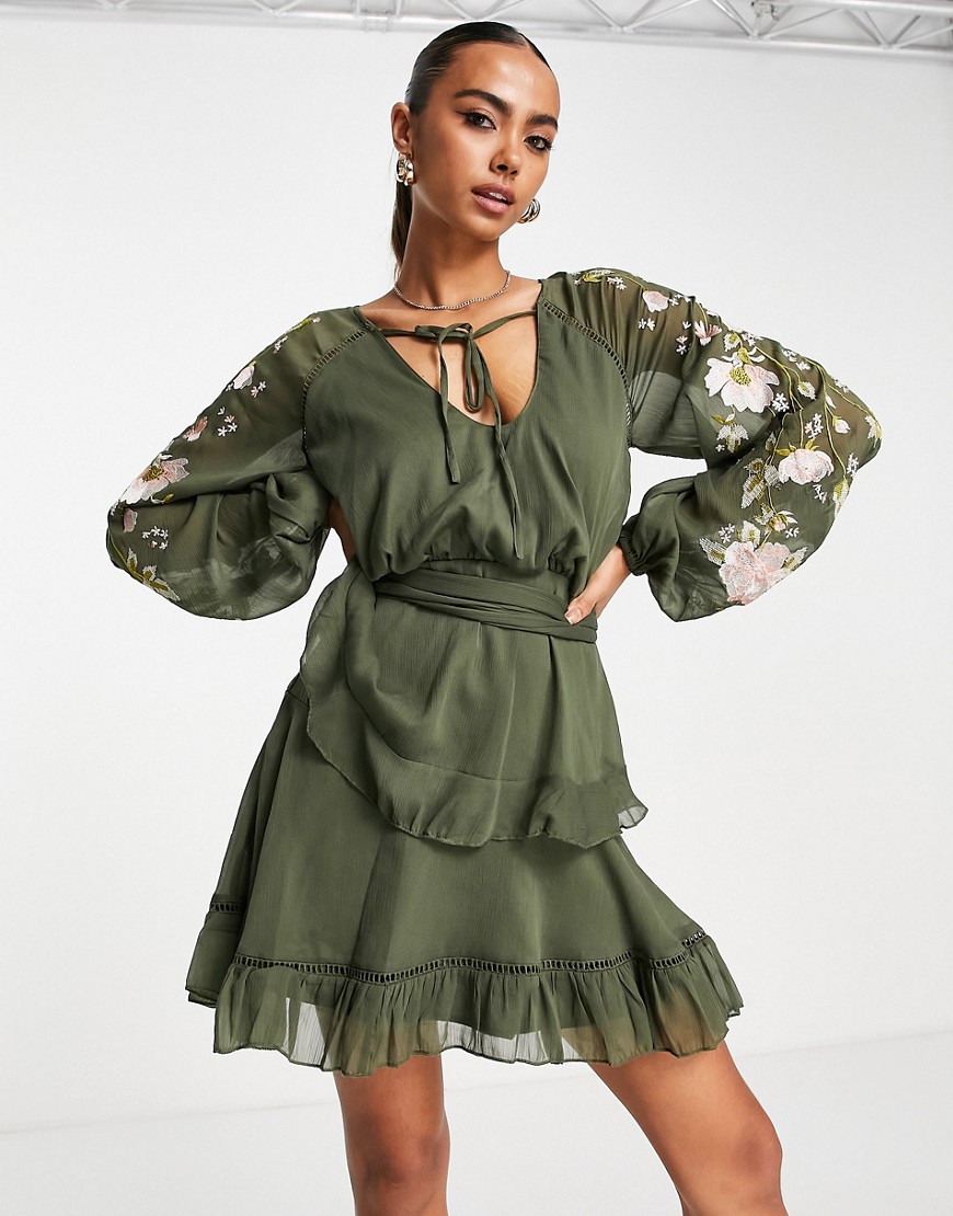 ASOS DESIGN blouson sleeve tiered mini dress with cross stitch embroidery detail and tie in khaki-Gr