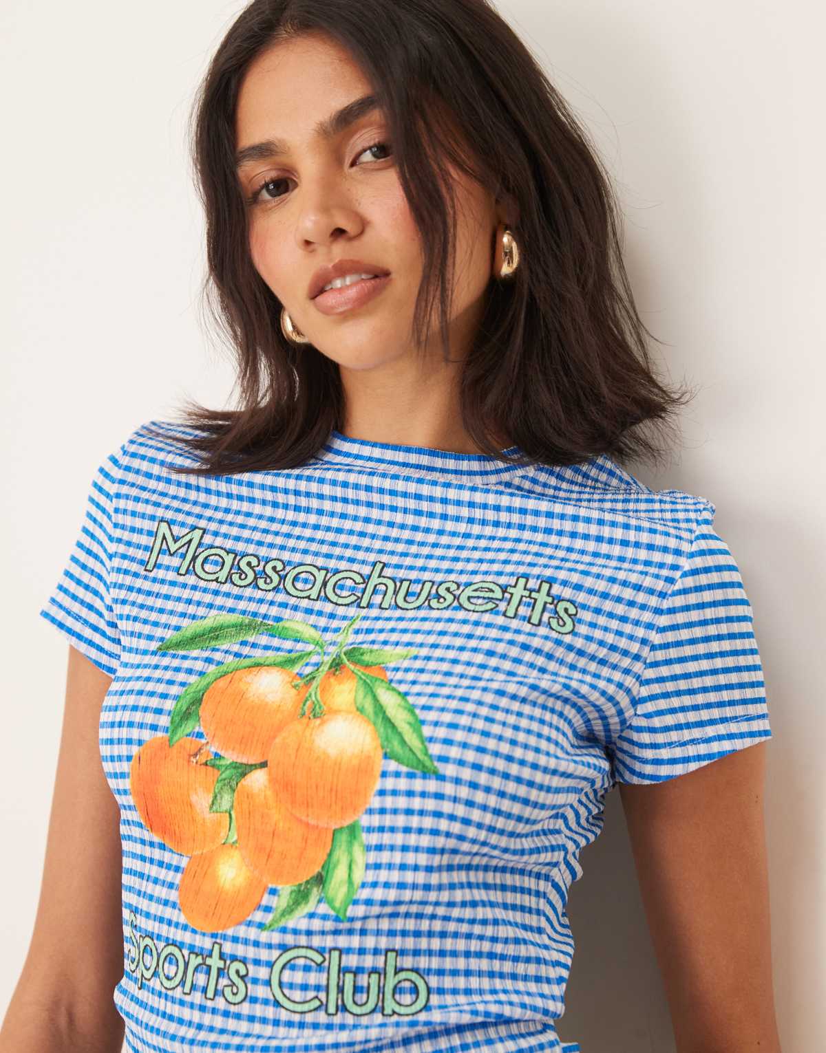 ASOS DESIGN blue gingham baby tee with orange graphic