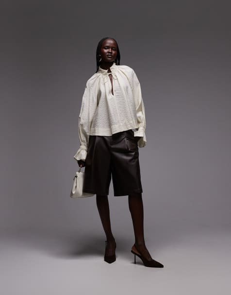 ASOS DESIGN – Blus med volym och knytning i halsen och muddarna - view 1