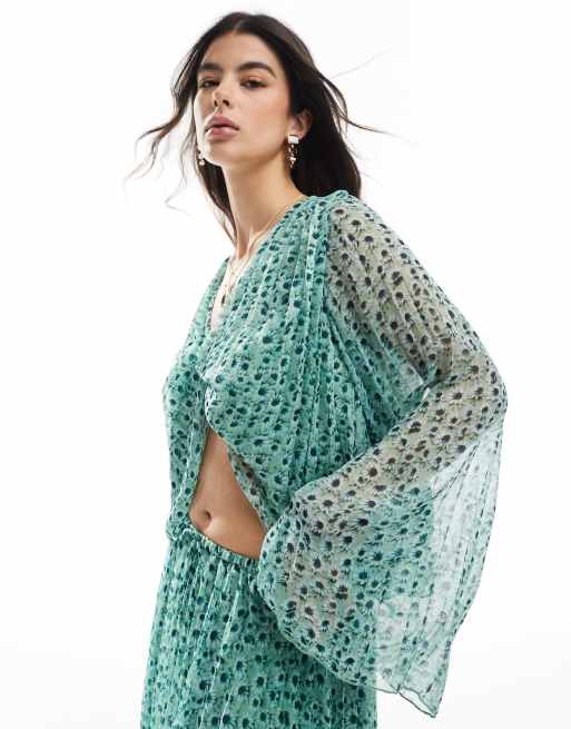 ASOS DESIGN - Blusa a pieghe con stampa a fiori e dettaglio attorcigliato sul davanti in coordinato