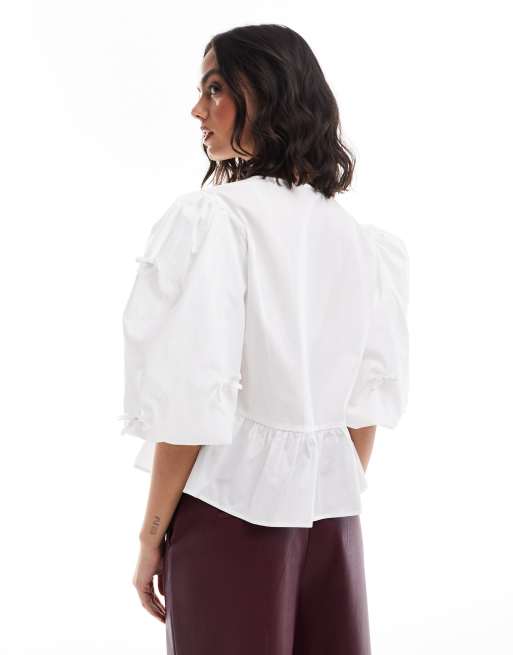 Blusa bianca con fiocco shop