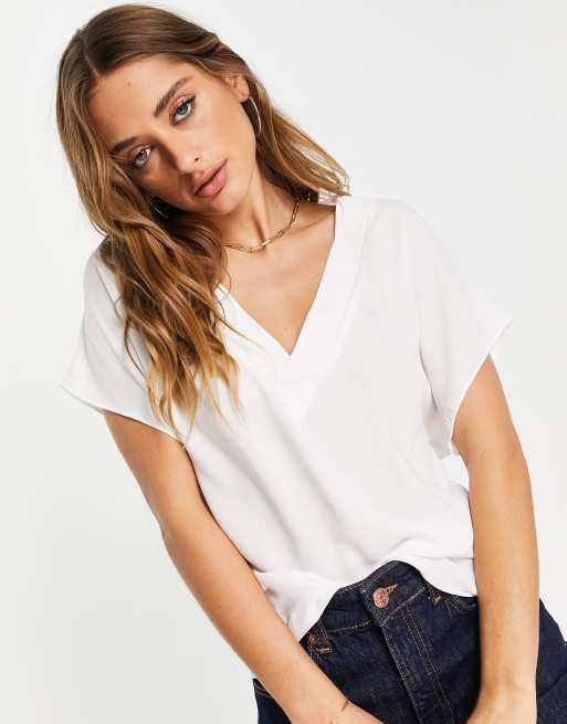 ASOS DESIGN - Blusa bianca con scollo a V