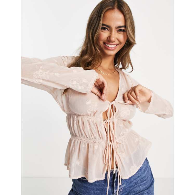 ASOS DESIGN Blusa con laccetti sul davanti trasparente ricamata