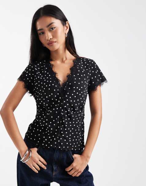 ASOS DESIGN - Blusa da giorno nera a pois con finiture in pizzo - view 1