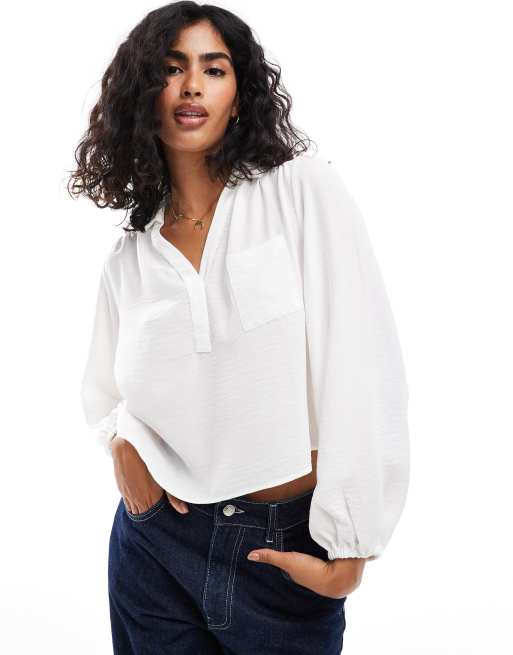 ASOS DESIGN Blusa morbida color avorio con scollo a V e tasca ASOS