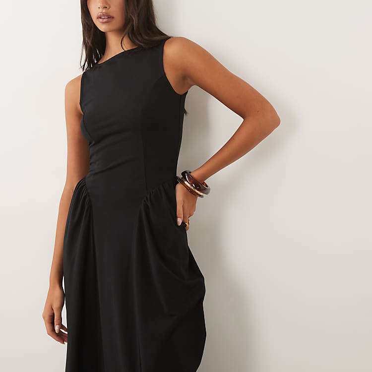 black boat neck midi dress Polka Dot Muriel reveals a flouncy volume skirt that adds dimension and flair Black Boat Neck Ruched Long