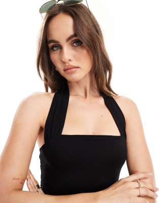 ASOS DESIGN bodycon midi dress with halter strap in black | ASOS