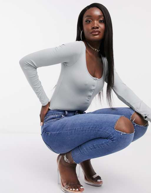 ASOS DESIGN - Bodysuit met drukknopen vooraan en duimsgaten in saliegroen