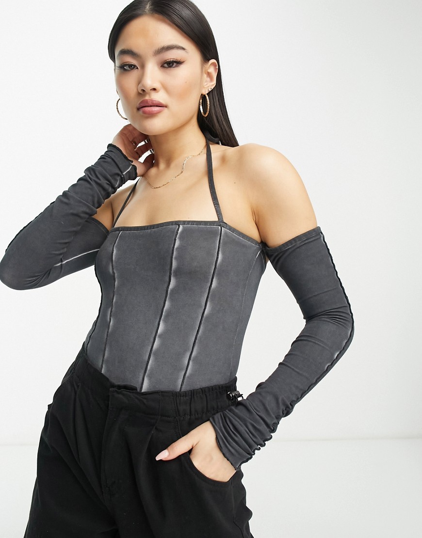ASOS DESIGN bodysuit with seam details and halter strap in washed black