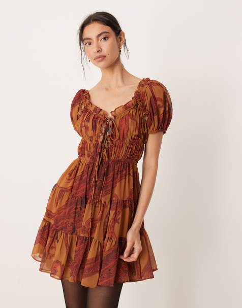 ASOS DESIGN boho ruffle puff sleeve mini dress in rust paisley - view 1