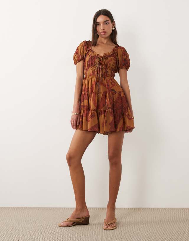 asos bohemian dress DESIGN boho ruffle puff sleeve mini in rust paisley Material:Lace Alfred Sung Size 10 Structure: Illusion corset bodice with exposed boning this dress ensures a