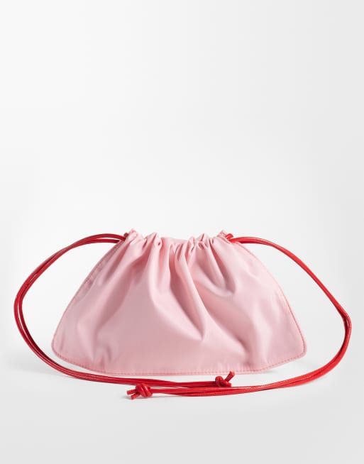 ASOS DESIGN - bolso clutch tipo pouch en rosa, 1 de 4