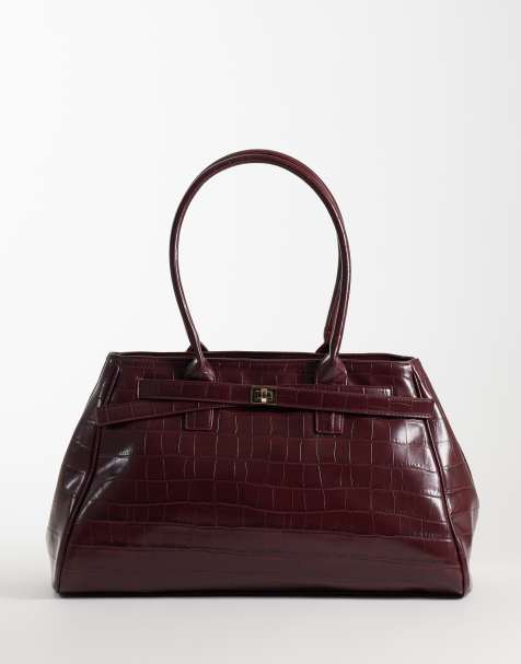 ASOS DESIGN bolso tote estructurado con efecto cocodrilo y detalle de cinturón con hebilla en burdeos - view 1