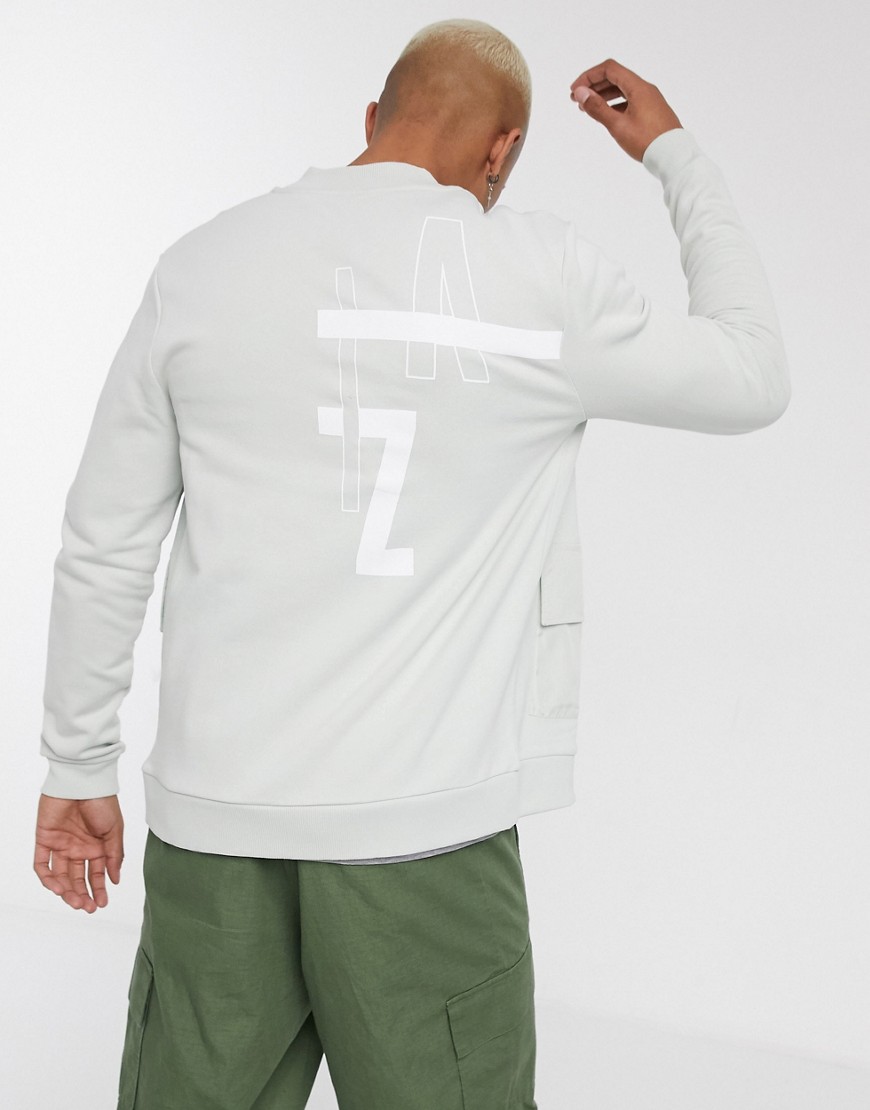 ASOS DESIGN - Bomber in jersey grigio con scritta stampata sul retro e tasche