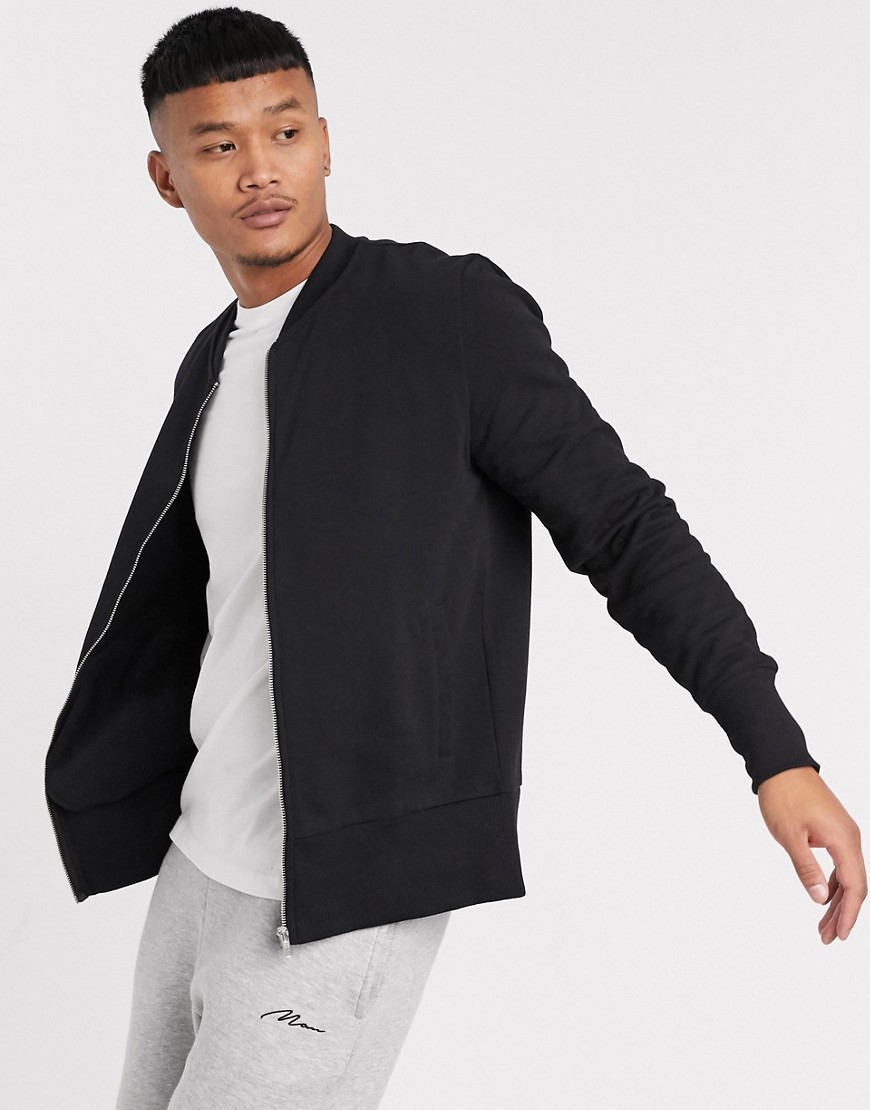 ASOS DESIGN - Bomber in jersey nero a coste larghe