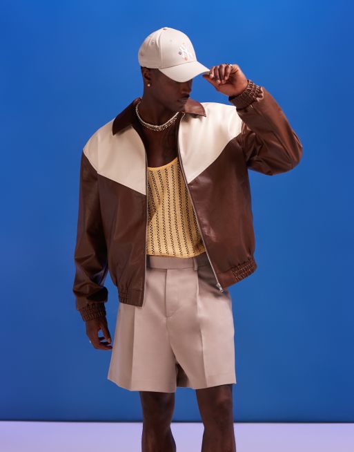 ASOS DESIGN - Bomber oversize in pelle sintetica marrone con dettaglio cut and sew