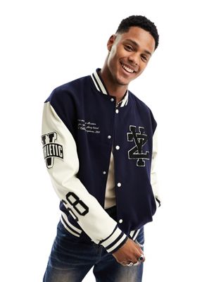 ASOS DESIGN oversized varsity bomber jacket in navy with faux leather sleeves - ASOS Price Checker