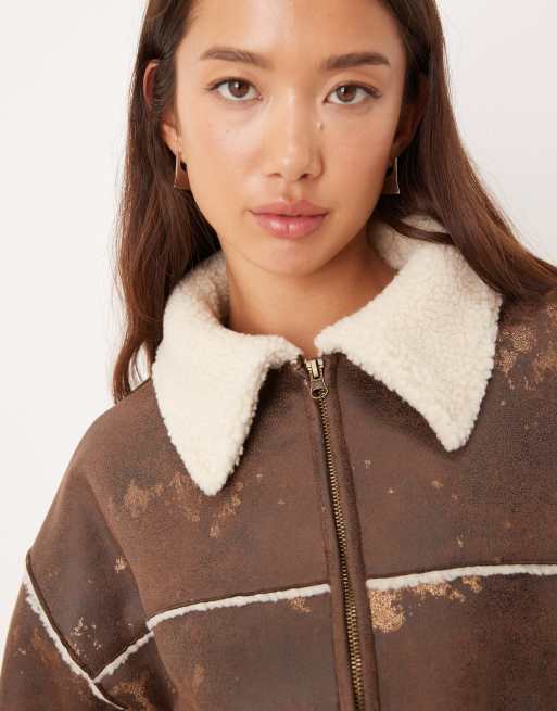 ASOS DESIGN bonded borg fleece zip up cropped jacket in brown and cream