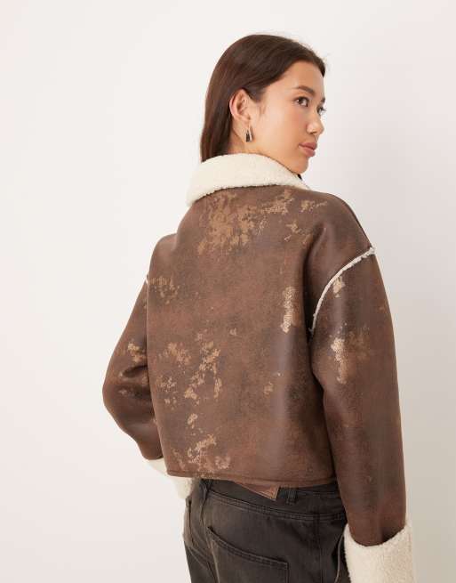 ASOS DESIGN bonded borg fleece zip up cropped jacket in brown and cream