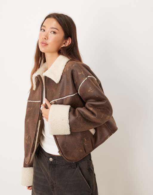 ASOS DESIGN bonded borg zip through cropped jacket in brown and cream