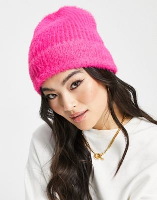 ASOS DESIGN fluffy knit beanie in bright pink - ASOS Price Checker