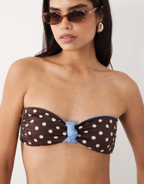 ASOS DESIGN Bonnie polka dot knot front reversible bandeau bikini top in choc polka dot - view 1