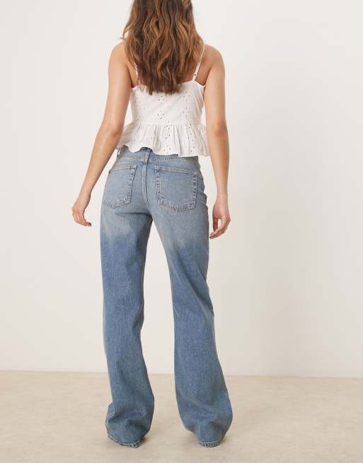 ASOS DESIGN bootcut jeans in mid wash blue , 3 of 5