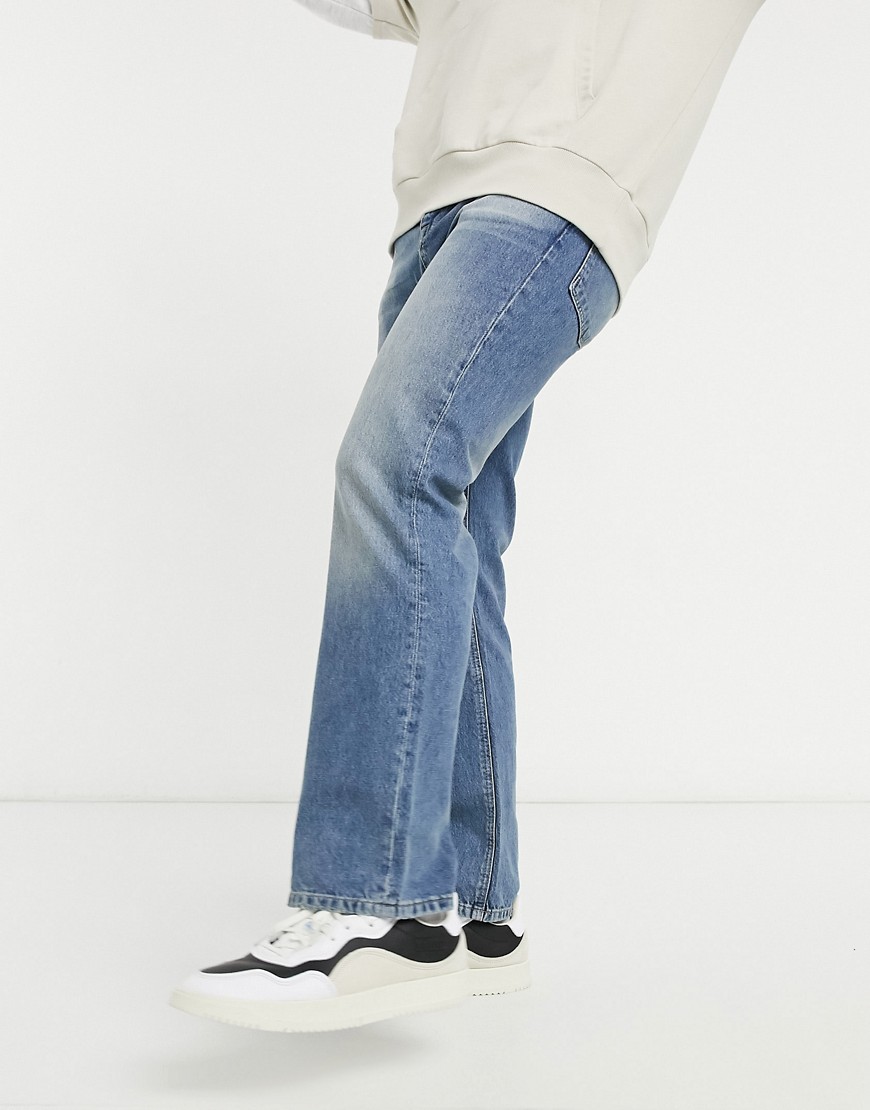 Asos Design Bootcut Jeans In Mid Wash Blue