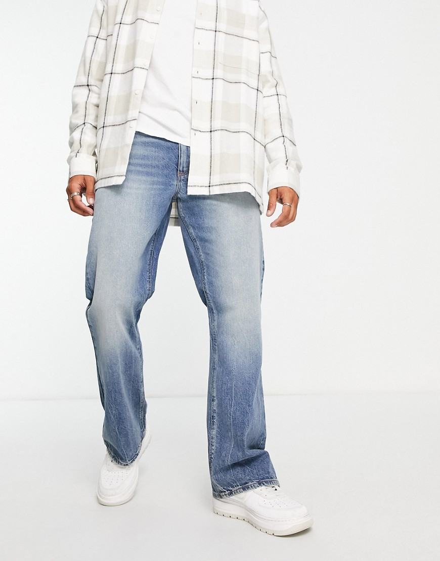 ASOS DESIGN bootcut jeans in tinted dark wash-Blue
