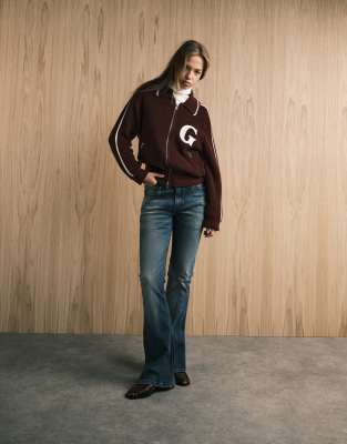 ASOS DESIGN - Bootcut-Jeans in Vintage-Waschung mit niedrigem Bund-Blau