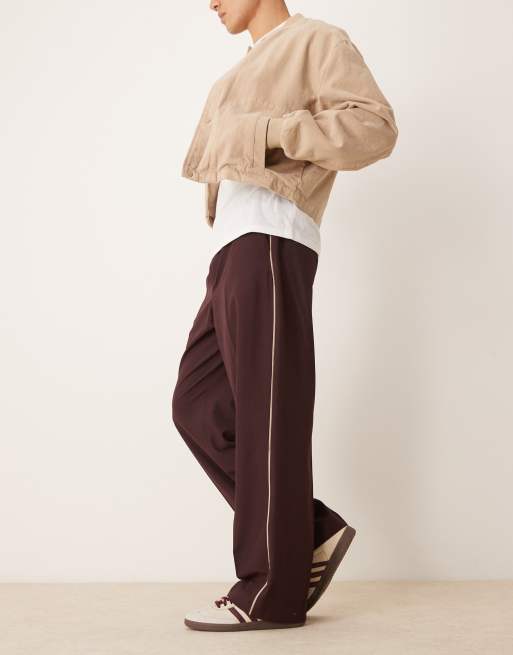 ASOS DESIGN – Bordowe eleganckie spodnie wciągane z szerokimi nogawkami i kontrastowymi lamówkami