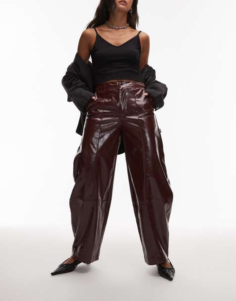 ASOS DESIGN faux leather barrel leg trousers with tab detail in burgundy
