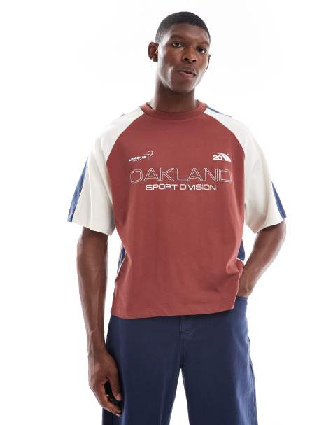 ASOS DESIGN boxy oversized t-shirt with cut and sew panelling and sports graphics in burgundy