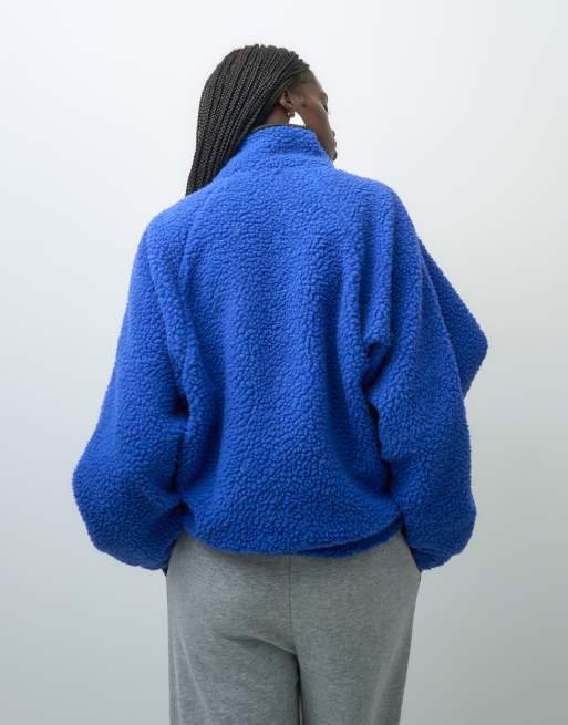 ASOS DESIGN borg half zip with contrast binding in blue and black, 2 of 4