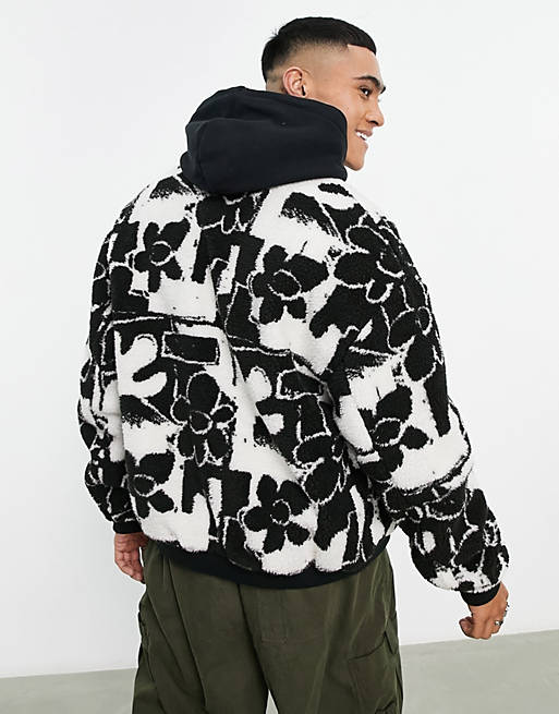 ASOS DESIGN borg walker jacket with floral print in black and white