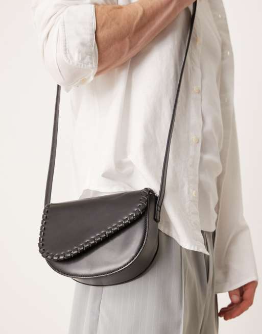 ASOS DESIGN - Borsa a tracolla nera con cuciture a sopraggitto