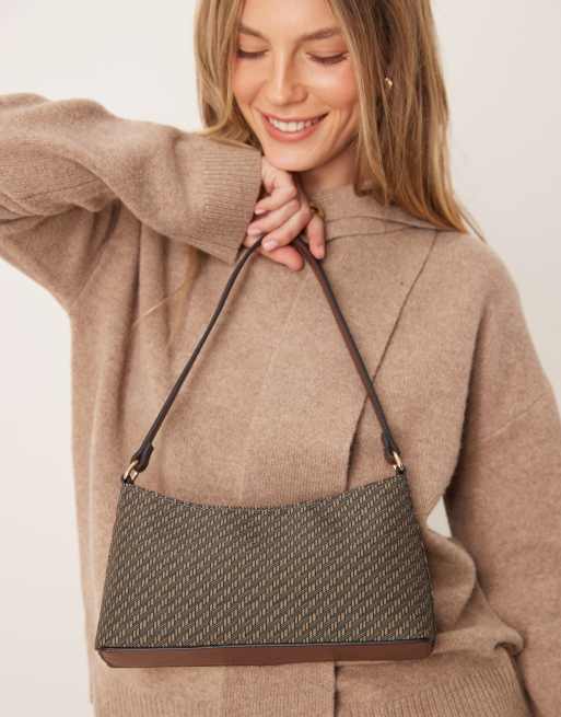 ASOS DESIGN Borsa da spalla media anni '90 con clip in metallo e
