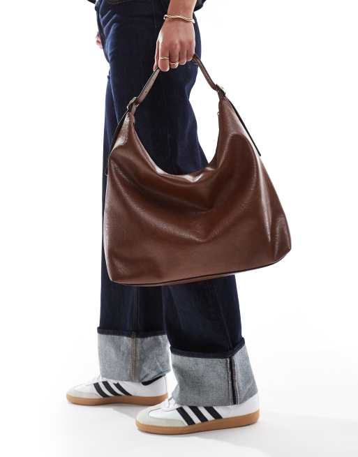 ASOS DESIGN - Borsa shopping color cuoio scuro con tracolla con fibbie