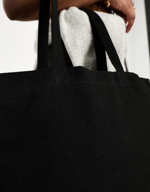 ASOS DESIGN - Borsa shopping nera in tela con tasca per laptop, 3 di 4