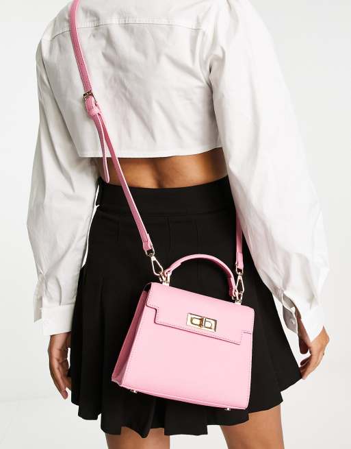 ASOS DESIGN - Borsetta rosa con chiusura con lucchetto, manico e tracolla rimovibile