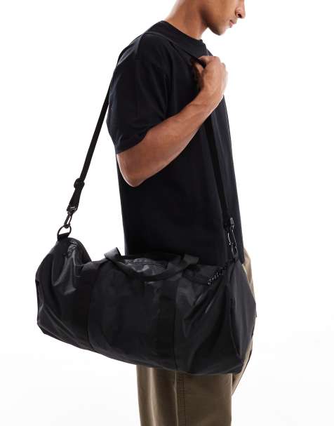 ASOS DESIGN - Borsone weekender cilindrico nero con tiretti a contrasto - view 1