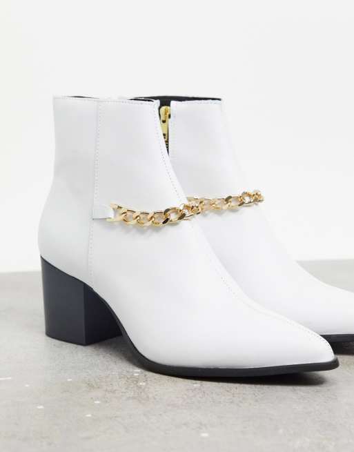 ASOS DESIGN Bottines Chelsea talon en cuir avec bout pointu et semelle blanche Blanc