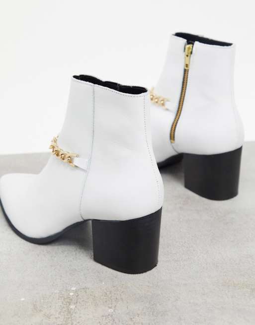 ASOS DESIGN Bottines Chelsea talon en cuir avec bout pointu et semelle blanche Blanc